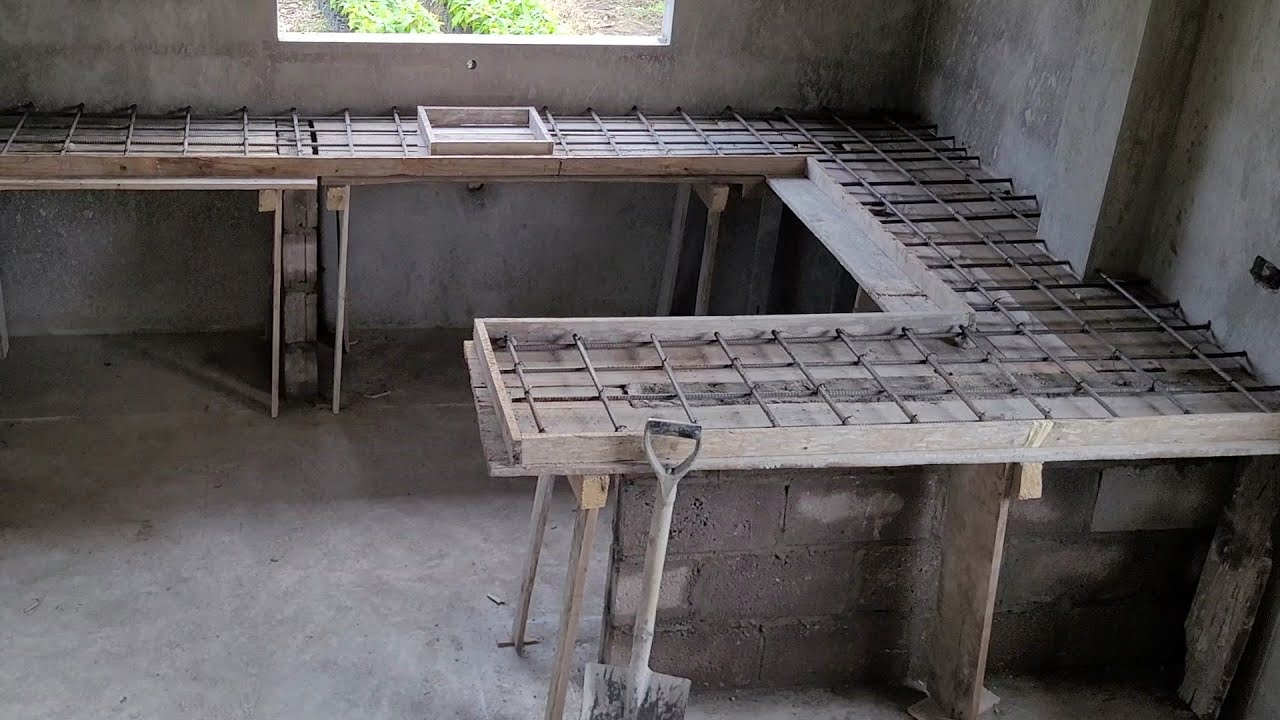 Mesada de concreto y madera con lavatorio